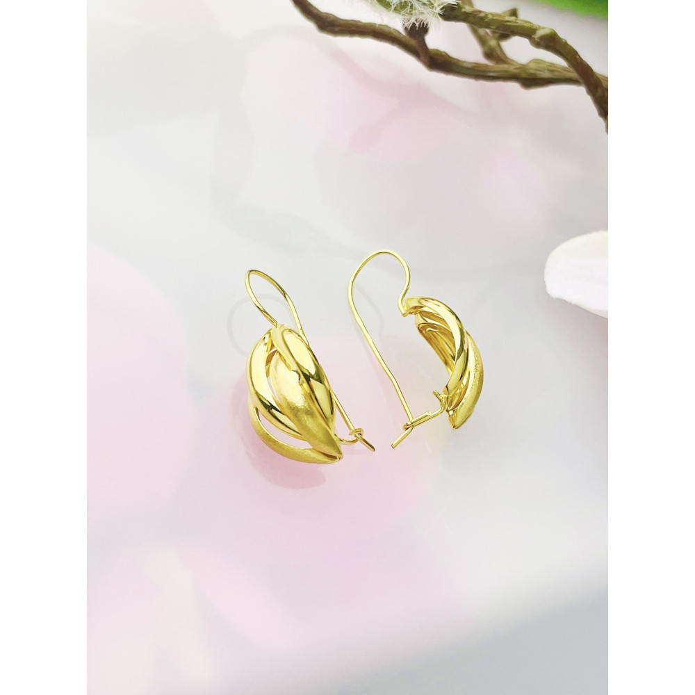 Złote kolczyki fantazyjnie splecione ogniki