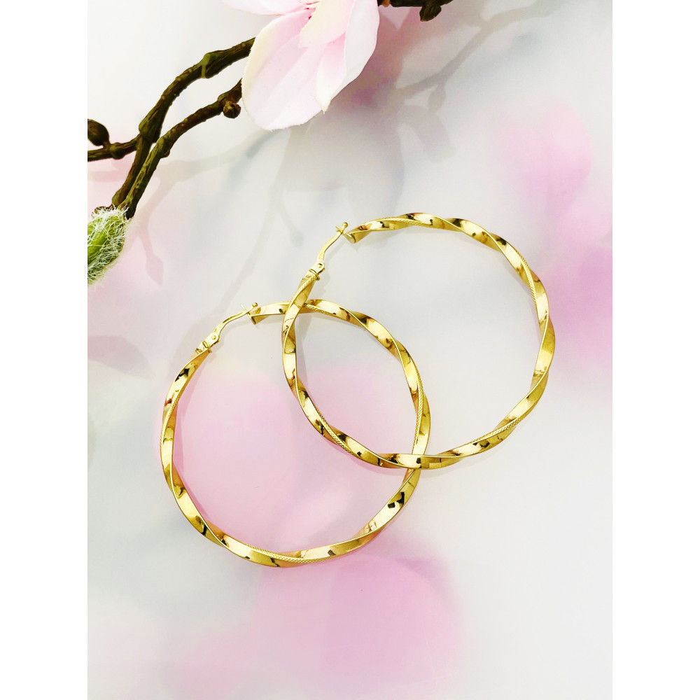 Złote kolczyki koła kręcone spiralne