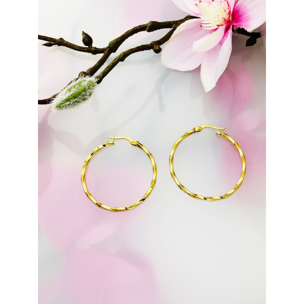 Złote kolczyki koła kręcone spiralne