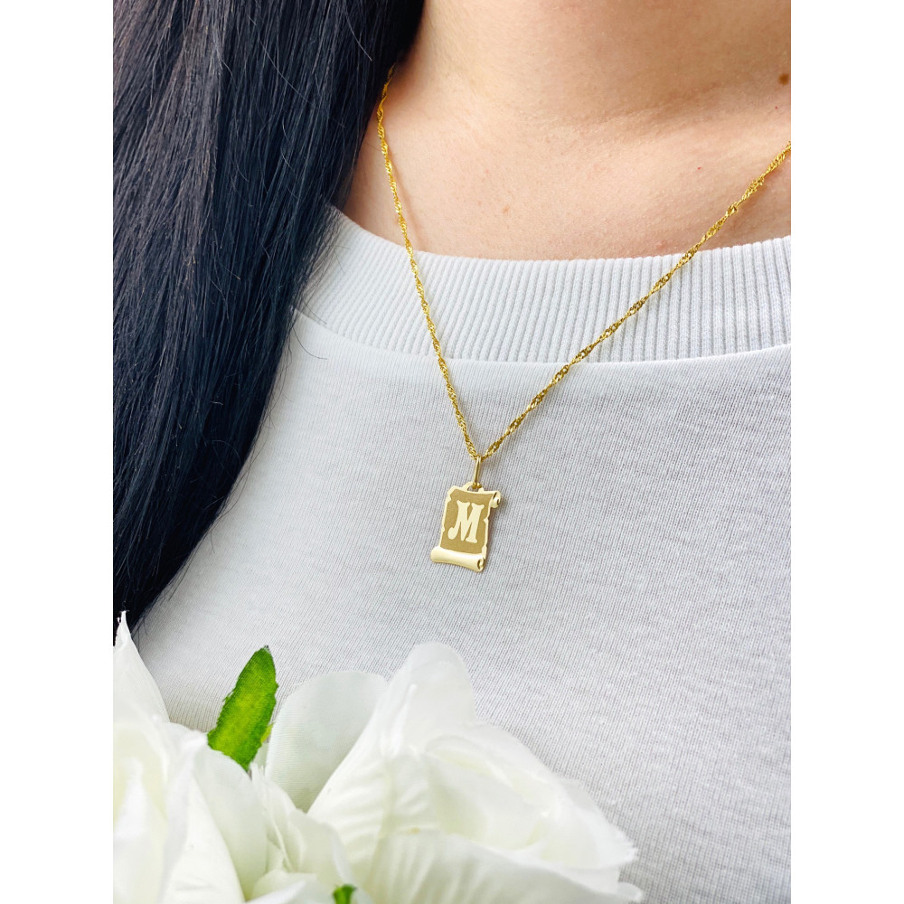 Złoty wisiorek zawieszka litera M