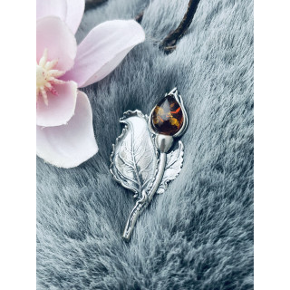 Srebrna broszka róża z bursztynem vintage