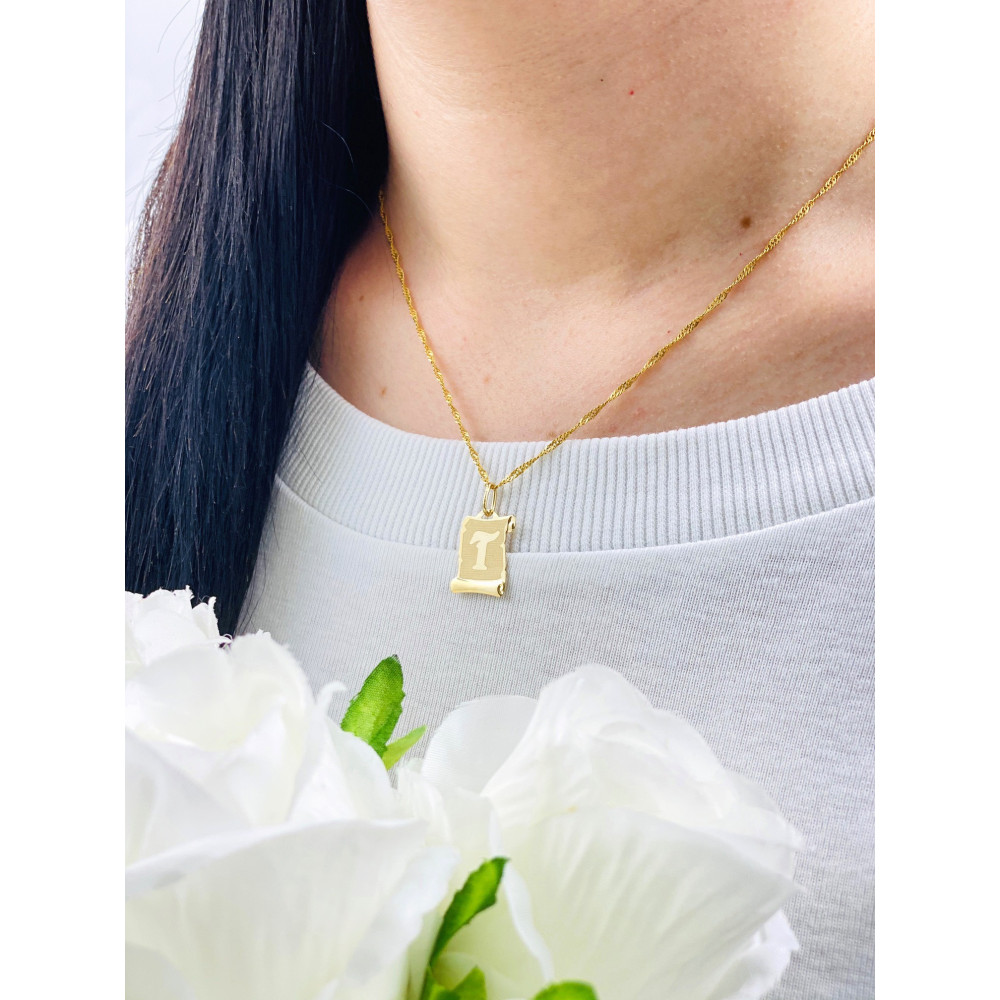 Złoty wisiorek zawieszka litera T