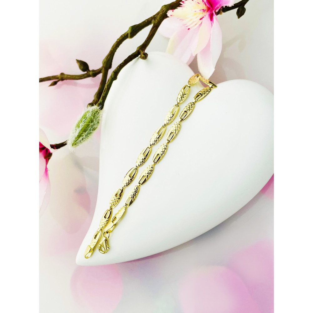 Złota bransoletka ozdobna owalne ogniwa frezowana