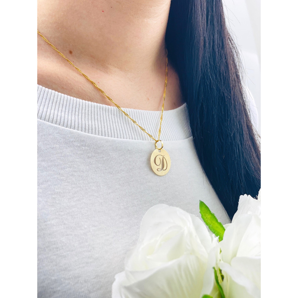 Złoty wisiorek zawieszka literka D