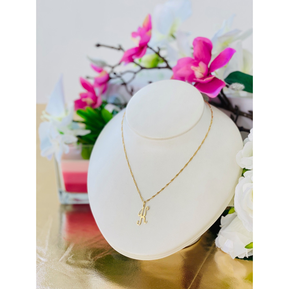 Złoty wisiorek zawieszka literka K