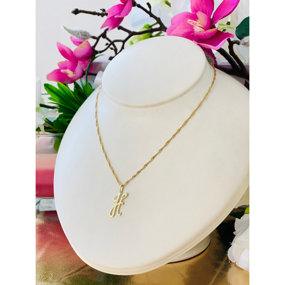 Złoty wisiorek zawieszka literka H