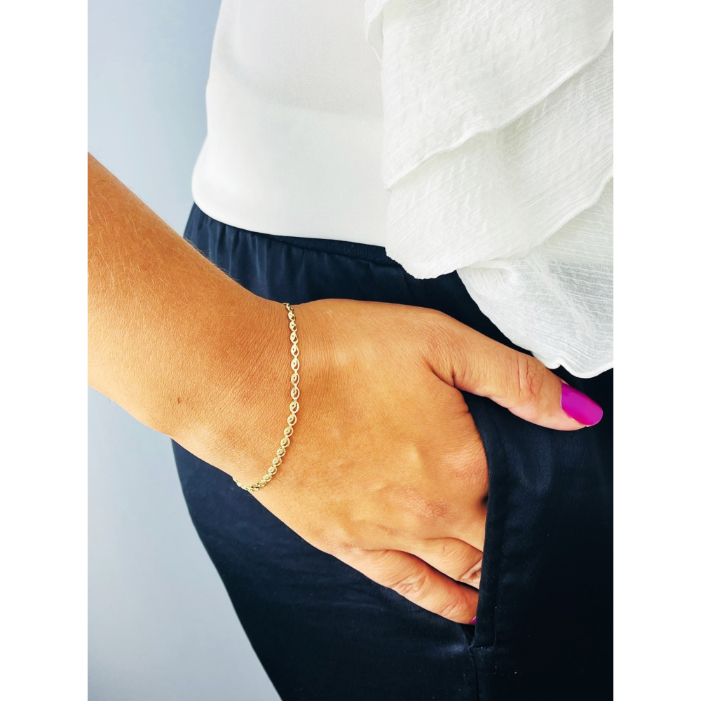 Złota bransoletka z owalnych ogniw ażurowa