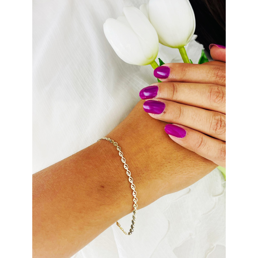 Złota bransoletka z owalnych ogniw ażurowa