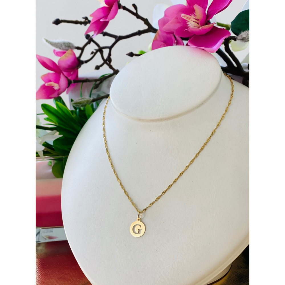 Złoty wisiorek zawieszka literka G