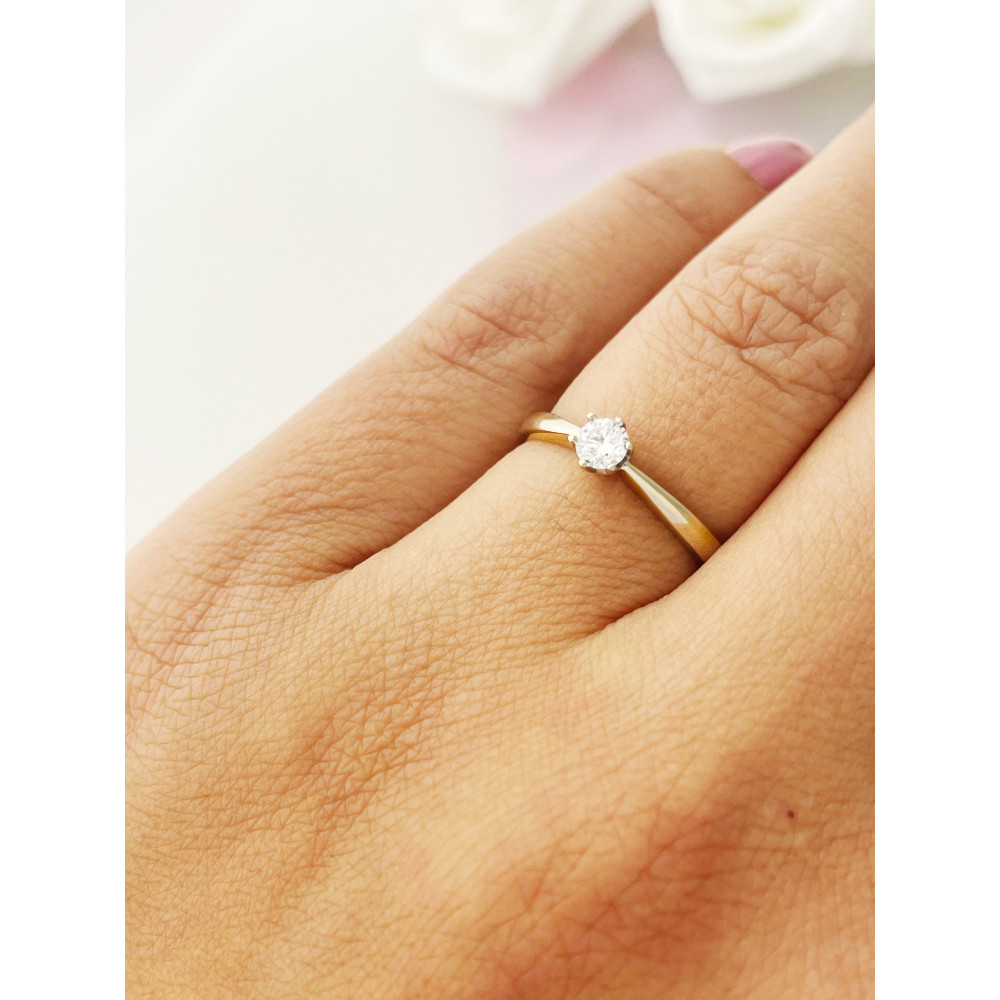 Złoty pierścionek rodowany zaręczynowy z brylantem