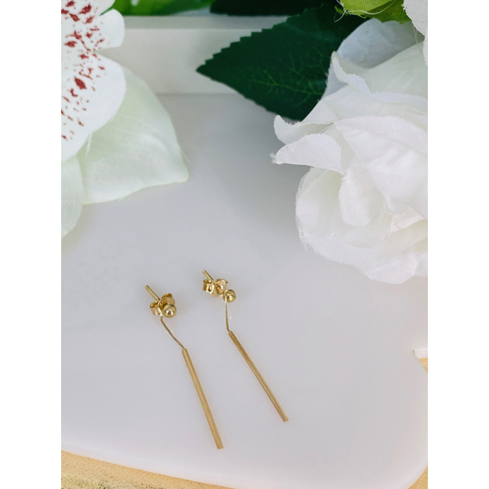 Złote kolczyki wiszące patyczki