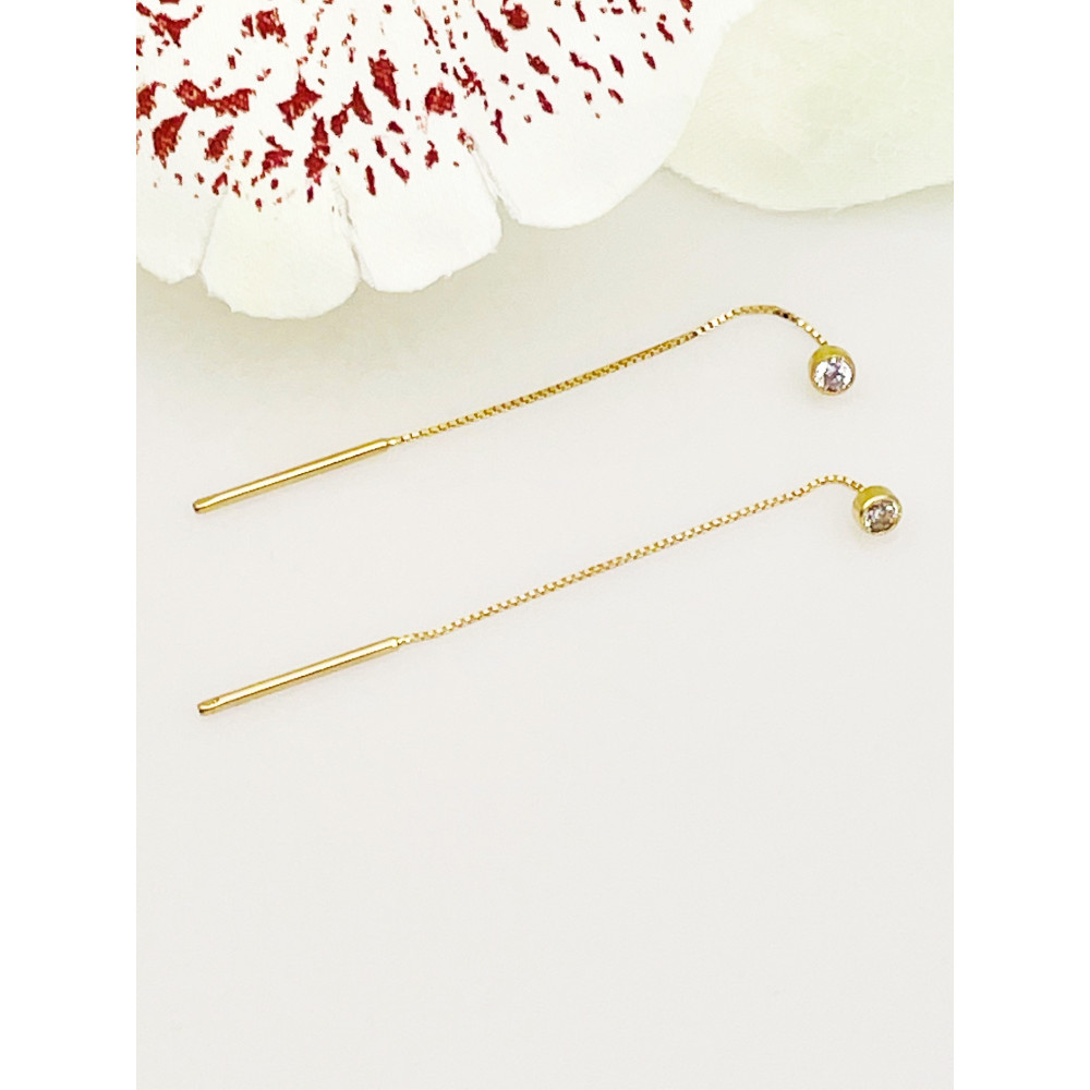 Złote kolczyki wiszące patyczki z cyrkonią