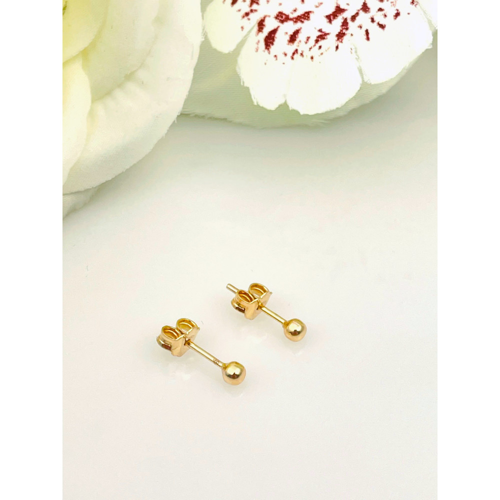 Złote kolczyki kuleczki