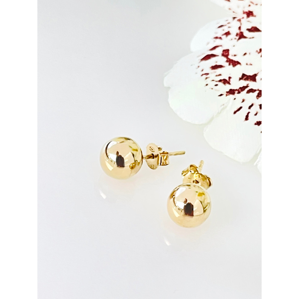 Złote kolczyki kuleczki