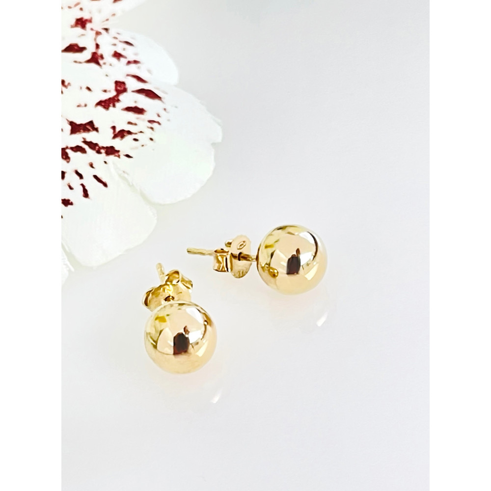 Złote kolczyki kuleczki