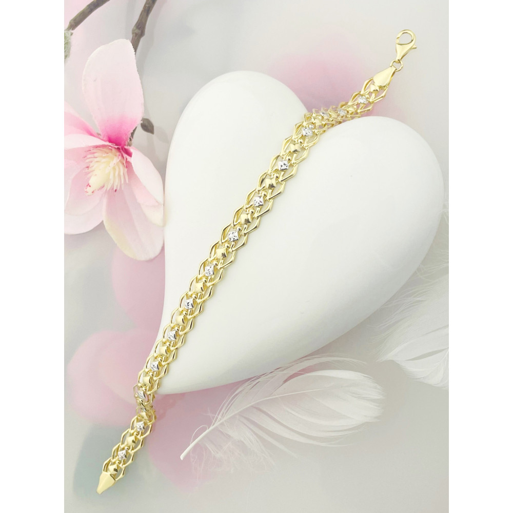 Złota bransoletka Bismarck ze zdobionymi modułami bikolor