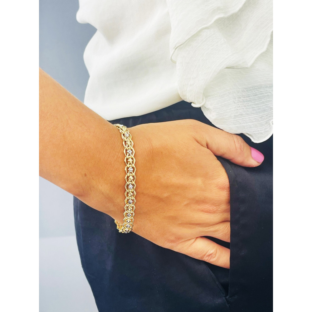 Złota bransoletka Bismarck ze zdobionymi modułami bikolor