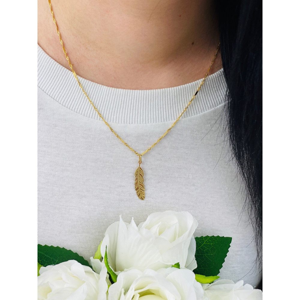 Złoty wisiorek zawieszka pióro