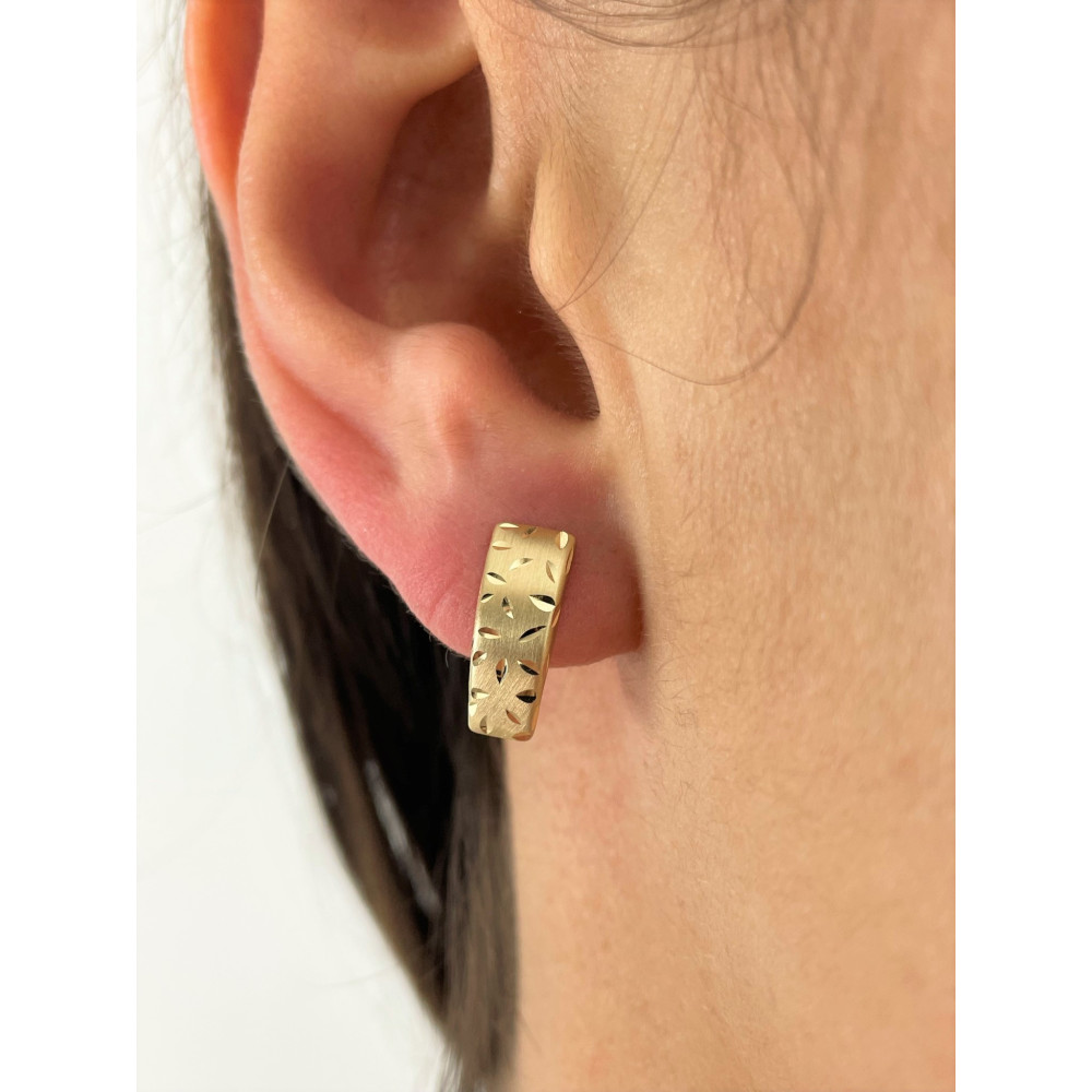 Złote kolczyki przecinki