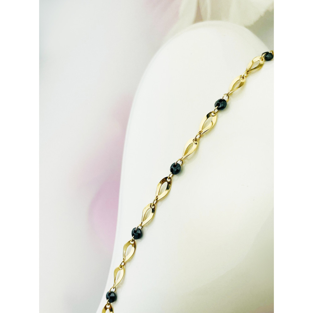 Złota bransoletka kocie oko z onyksem