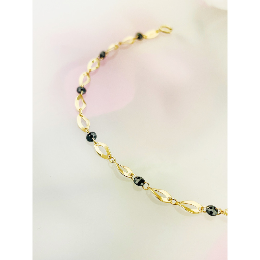 Złota bransoletka kocie oko z onyksem