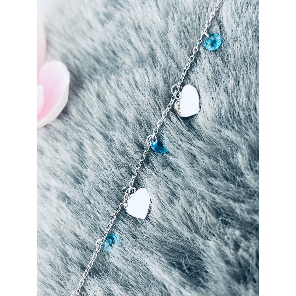 Srebrna bransoletka ankier z serduszkami i błękitnymi cyrkoniami