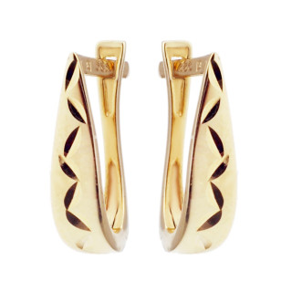 Złote kolczyki przecinki