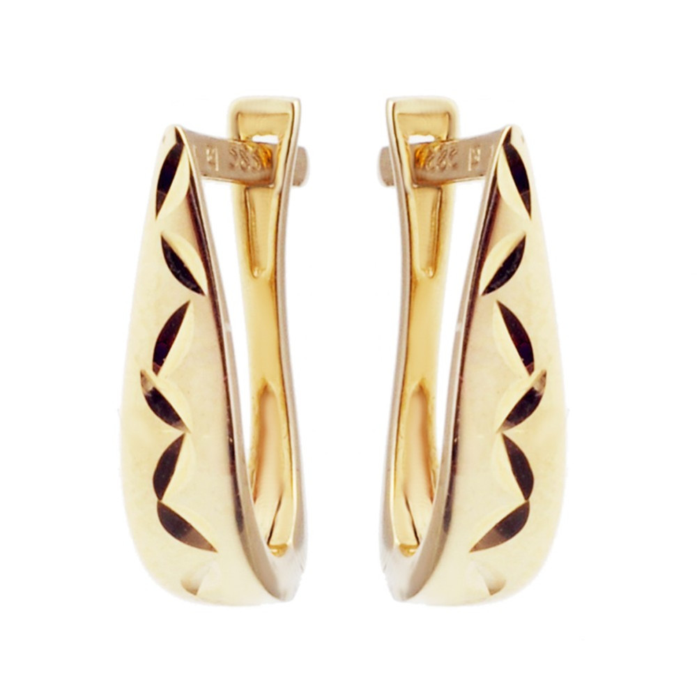 Złote kolczyki przecinki