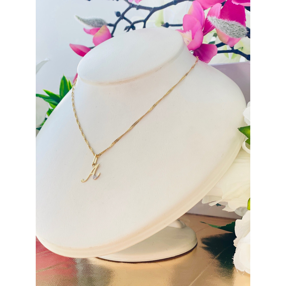 Złoty wisiorek zawieszka ozdobna literka A z cyrkoniami