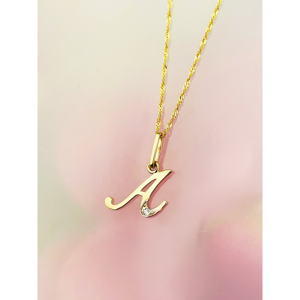 Złoty wisiorek zawieszka ozdobna literka A z cyrkoniami
