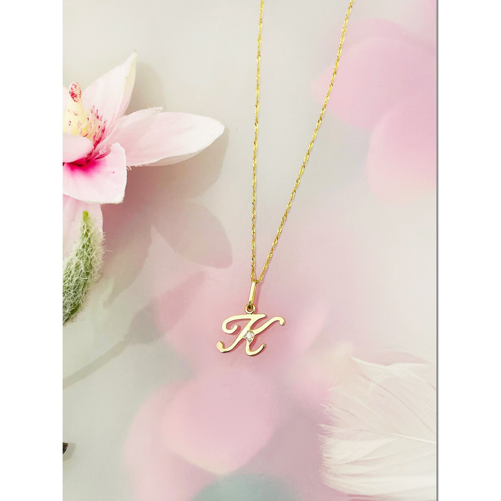 Złoty wisiorek zawieszka ozdobna literka K z cyrkoniami