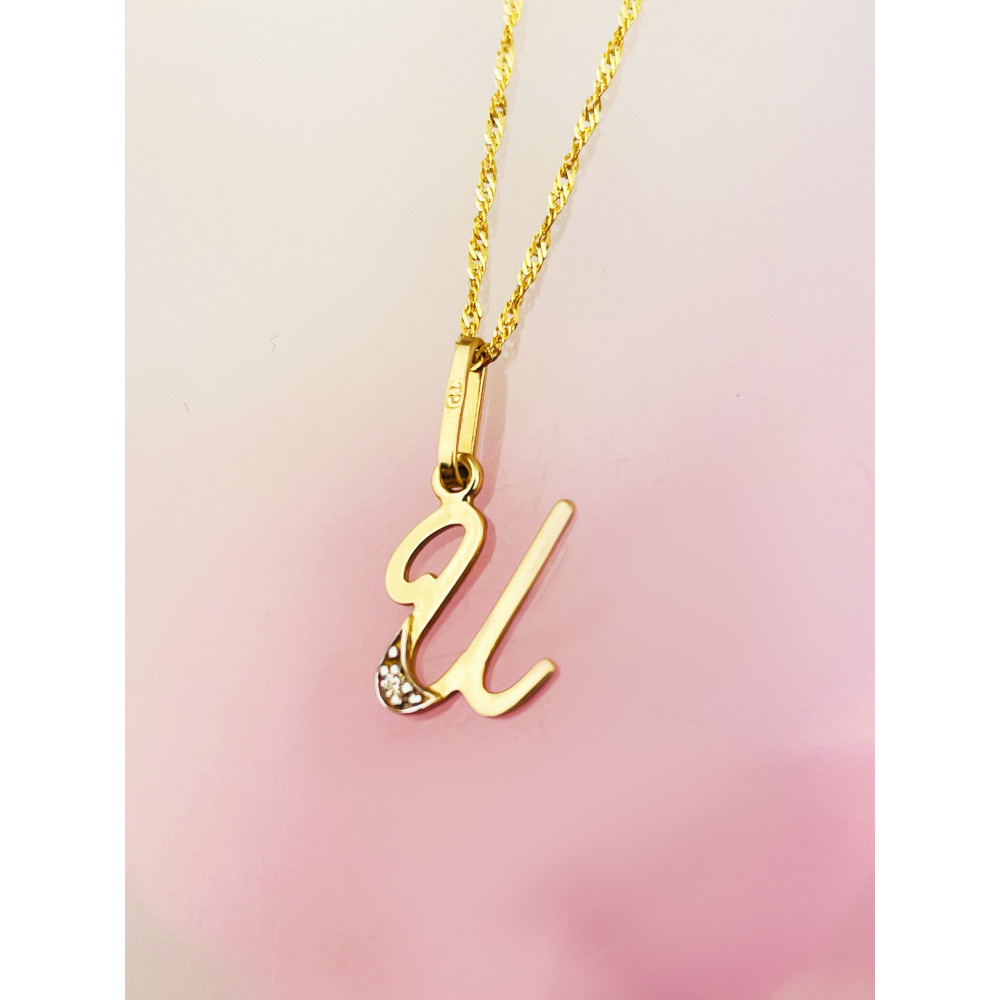 Złoty wisiorek zawieszka ozdobna literka U z cyrkoniami