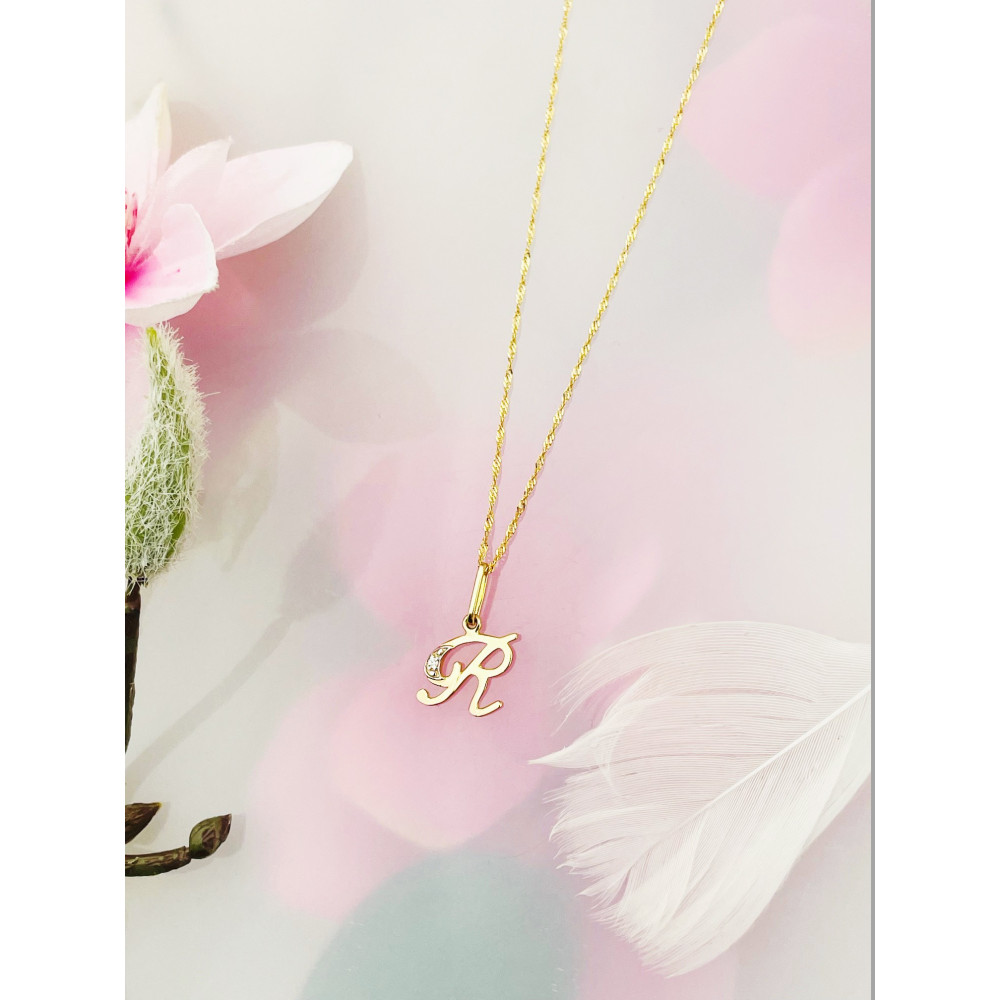 Złoty wisiorek zawieszka ozdobna literka R z cyrkoniami