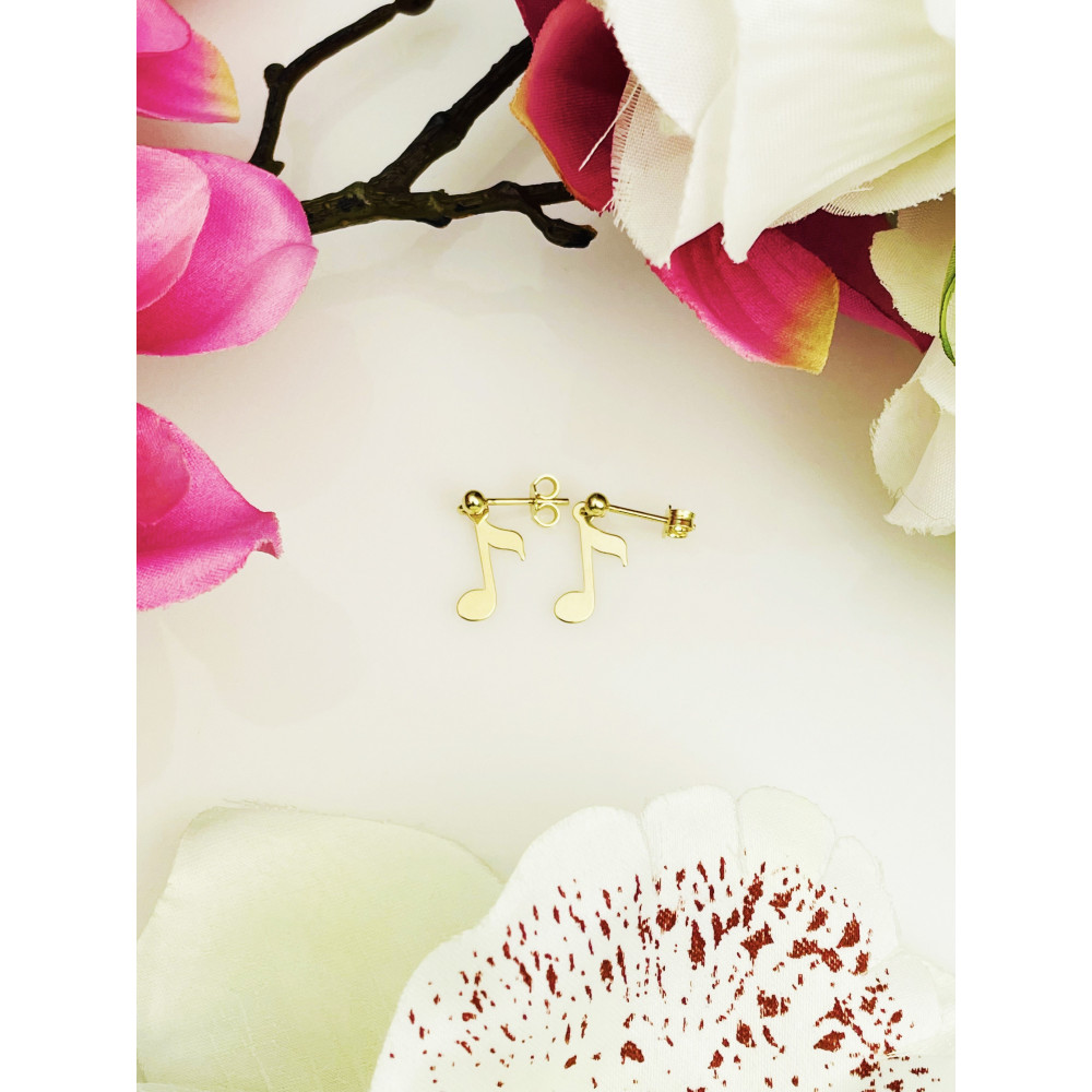 Złote kolczyki wiszące nutki