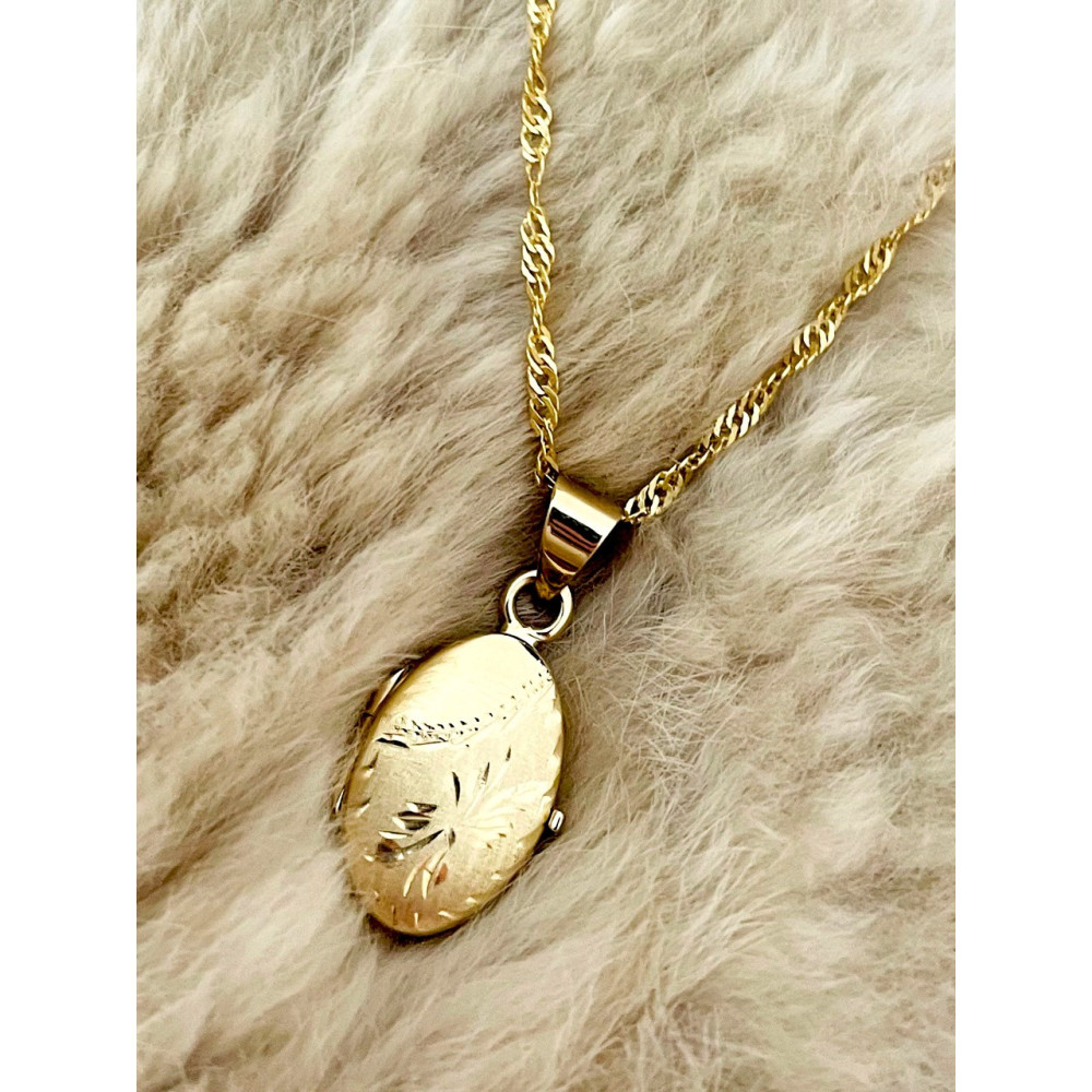 Złoty wisiorek zawieszka owalne puzderko