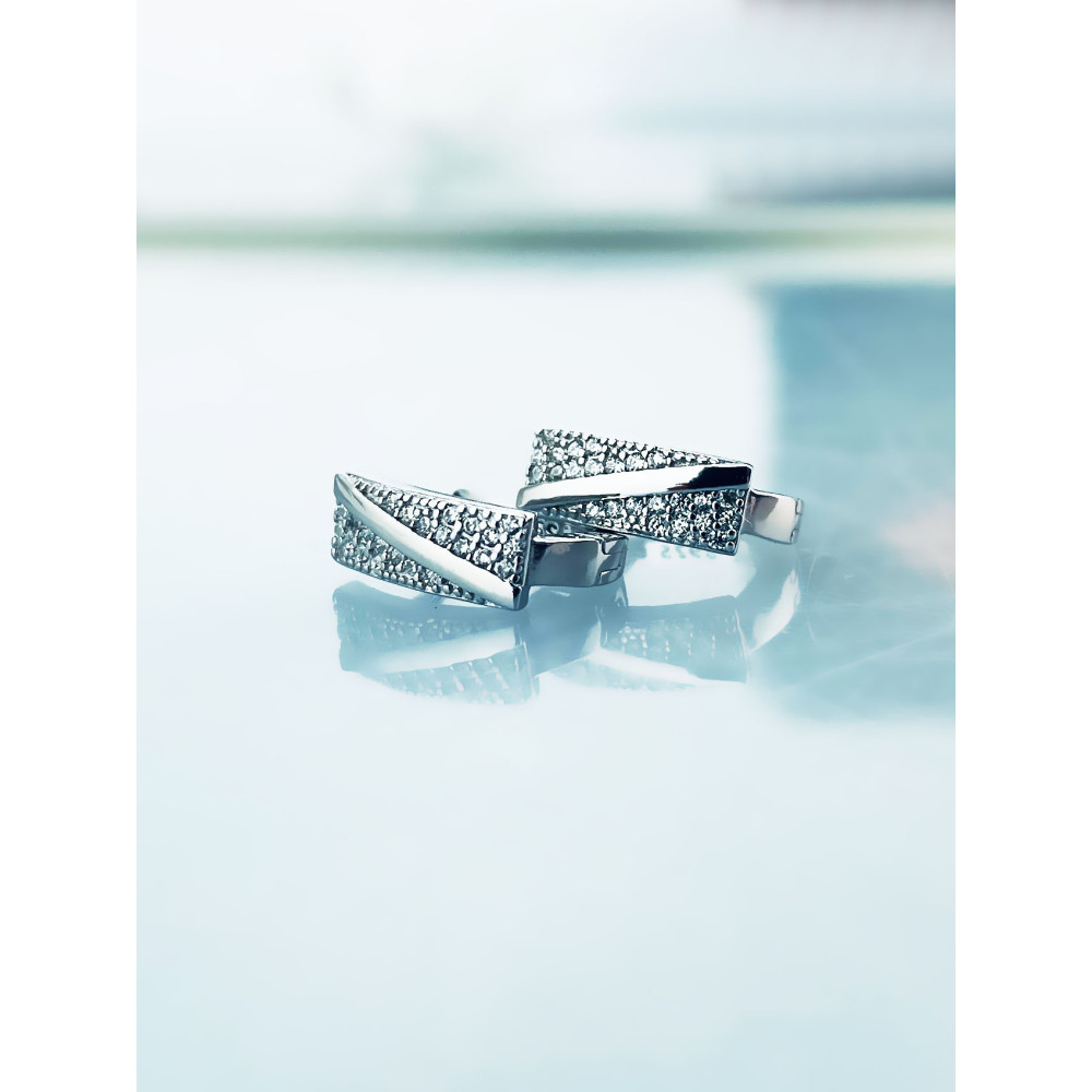 Srebrne kolczyki półkola z cyrkoniami