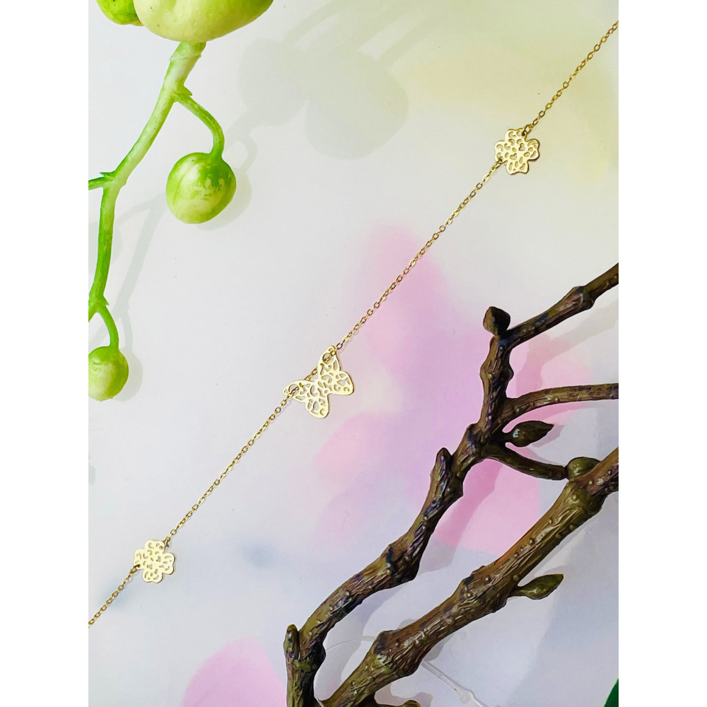 Złota bransoletka koniczynka motyl