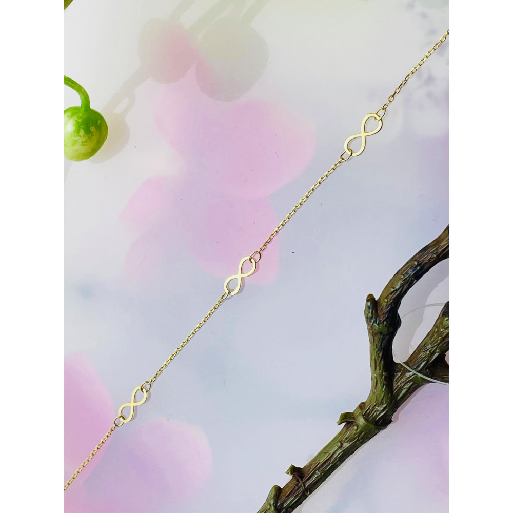 Złota bransoletka nieskończoność