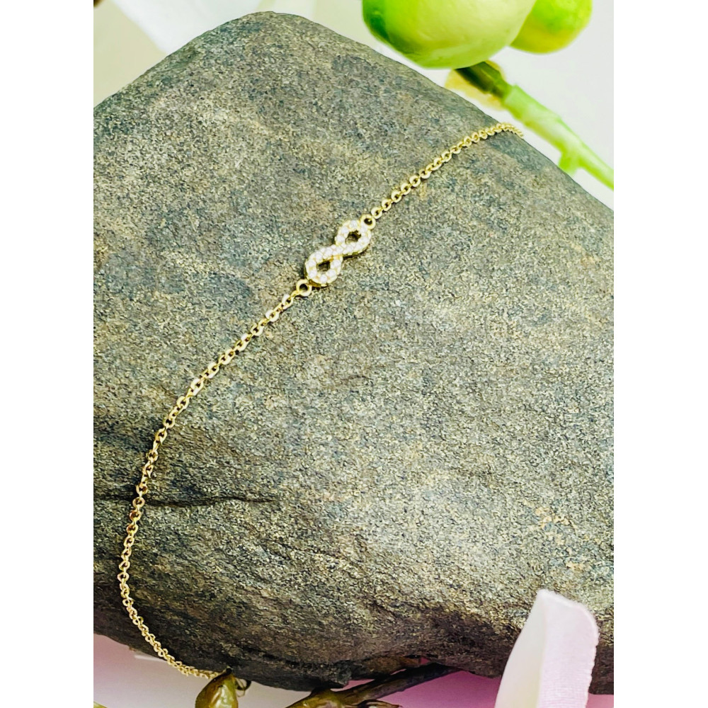 Złota bransoletka nieskończoność z cyrkoniami