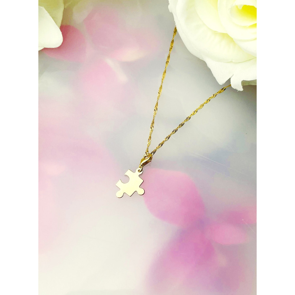 Złota zawieszka charms puzel