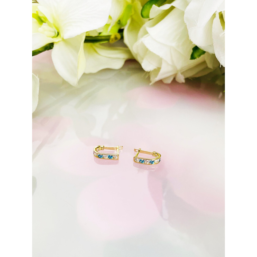 Złote kolczyki przecinki z cyrkoniami