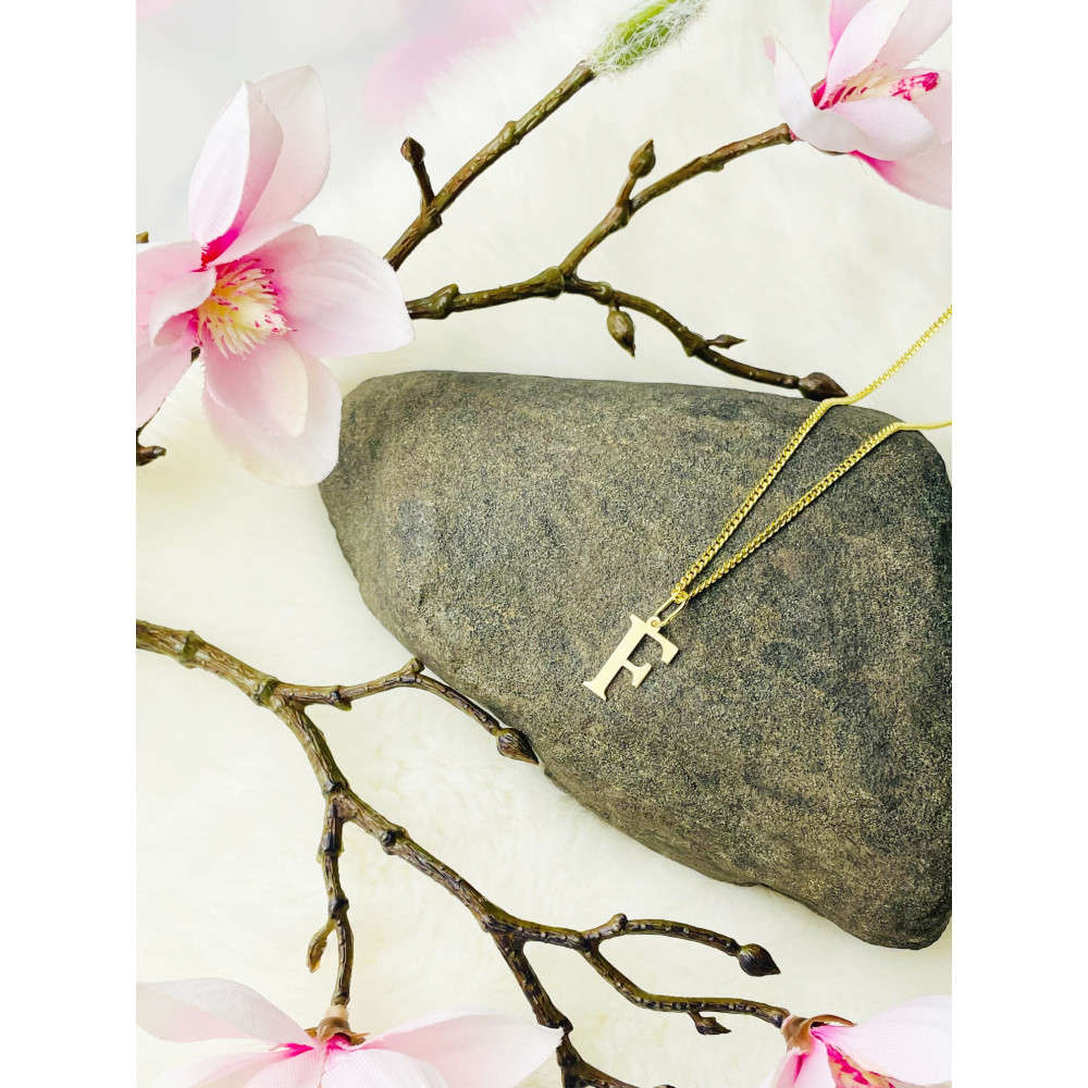 Złoty wisiorek zawieszka literka F