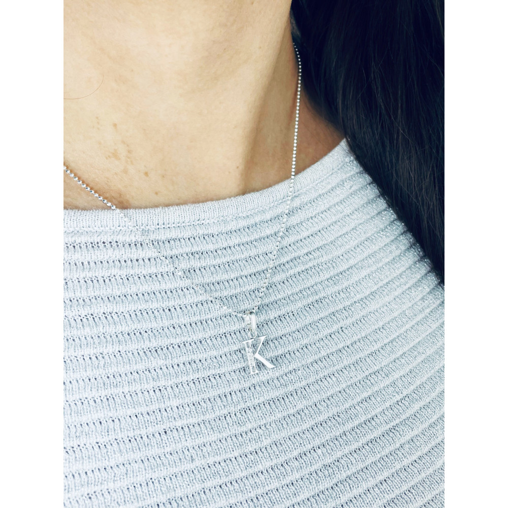 Srebrny wisiorek zawieszka literka K z cyrkoniami