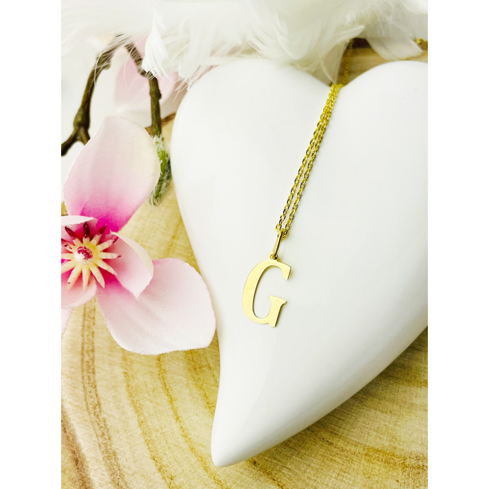 Złoty wisiorek zawieszka literka G